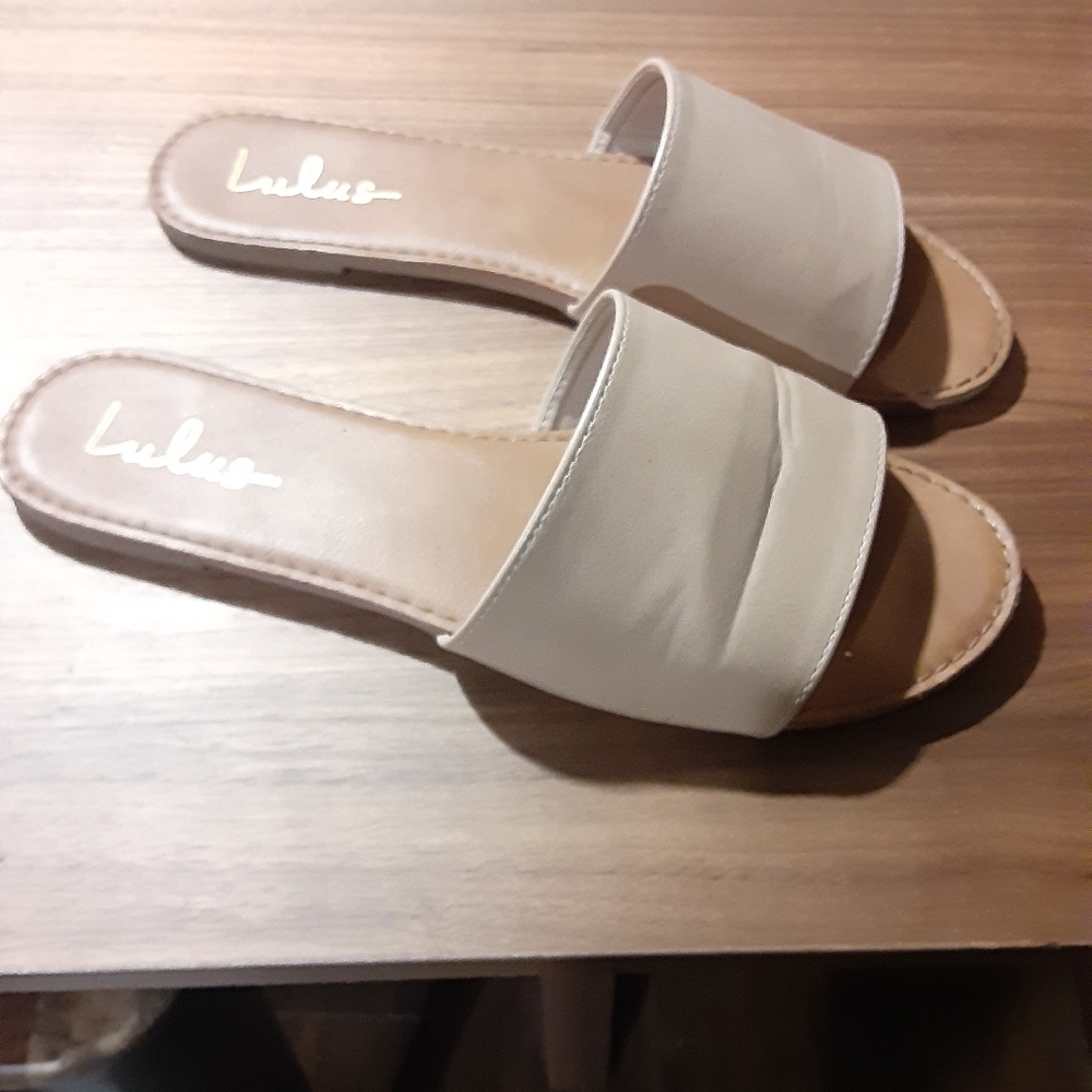 Beige slip on sandals